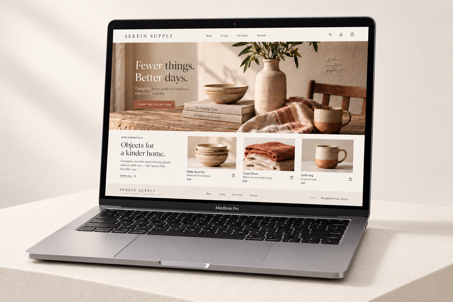 Serein Supply landing page displayed on a MacBook on a minimal off-white studio plinth